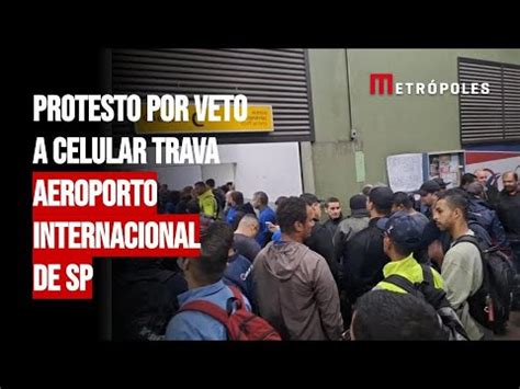 Protesto Por Veto A Celular Trava Aeroporto Internacional De Sp Youtube