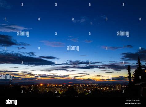 Night sky with city Stock Photo - Alamy