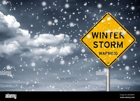 Winter Storm warning - road sign information Stock Photo - Alamy