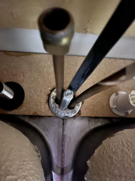 [help] Oven door screw hole is stripped and screw wont go in, what is