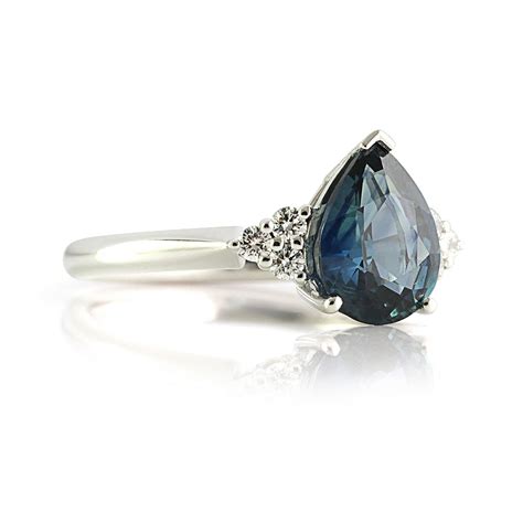 Aqua Blue Sapphire Diamond Halo Ring Bentley De Lisle