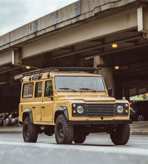 Yellow Land Rover Defender