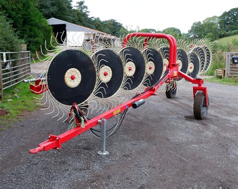 enorossi rt side rake  moving wet straw   hydraulic
