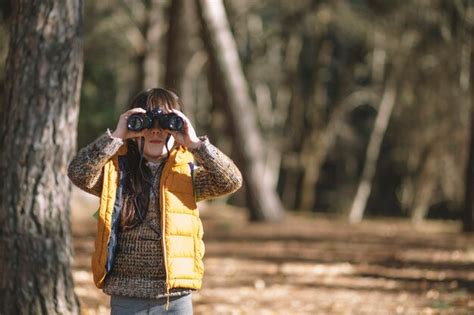 Free Photo Kid With Binoculars In Woods