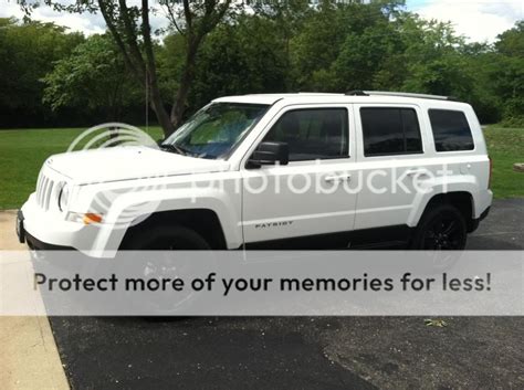 White jeep patriot black rims