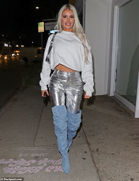 Chloe Sims Stuns In Silver Metallic Jeans And Thigh High Boots As She Goes Lingerie In LA
