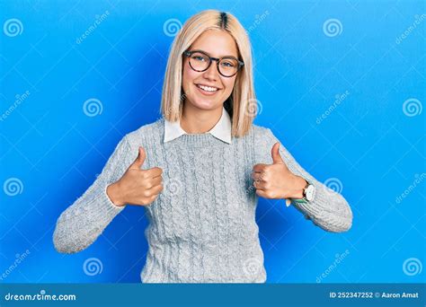 Beautiful Blonde Woman Wearing Glasses Success Sign Doing Positive Gesture With Hand Thumbs Up