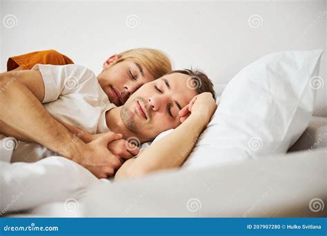 Loving Gay Couple Sleeping And Cuddling In Bed Stock Photo Image Of Lgbtq Cuddle