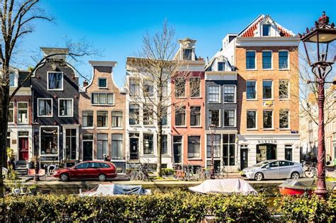 Premium Photo | A row of colorful houses in amsterdam