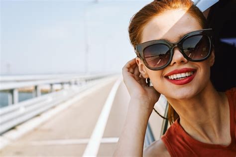 Premium Photo Close Up Of Woman Wearing Sunglasses