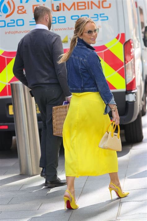 Amanda Holden Stuns In Yellow Satin Ensemble In London Moovie Stars