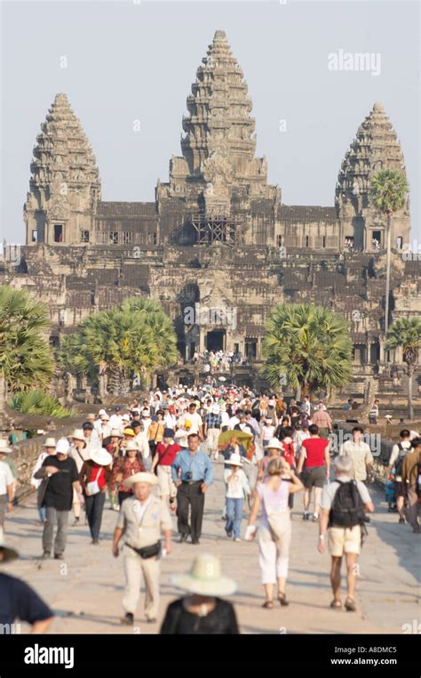 Crowds Flooding In To The Main Angkor Wat Temple On A Busy Tourist Day