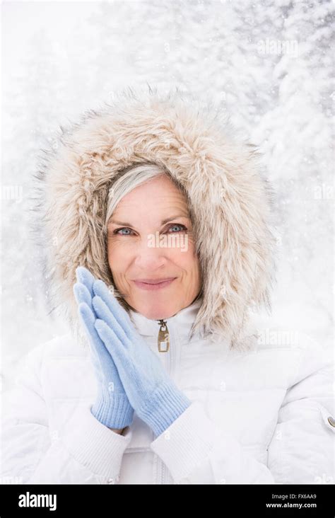 Mature Woman Happy Winter Vertical Hi Res Stock Photography And Images Alamy