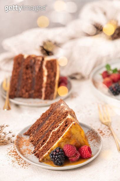 Delicious Semi Naked Chocolate Cake With Caramel Topping And Decorated With Blackberries And