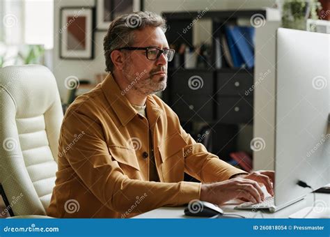 Mature Businessman With Grey Hair And Beard Typing On Keyboard Stock Photo Image Of Network