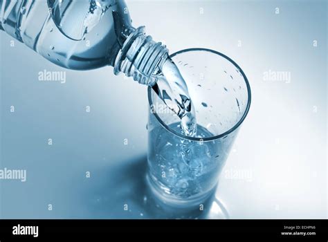 water pouring  glass  bottle stock photo alamy
