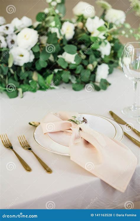 Wedding Table Decorated By Plates Knives And Forks Stock Photo Image