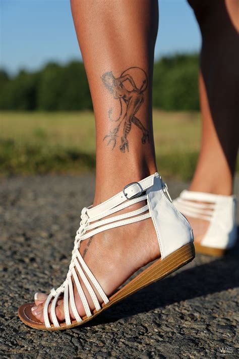 Pornstar Ashley Bulgari Hot Tattoo Boobs Photo