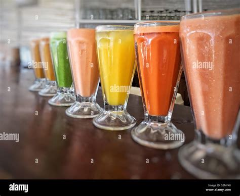 Smoothie And Fresh Juices In Juice Bar Cafe In Mexico On Counter Stock