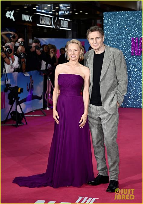 Pamela Anderson Gives Liam Neeson Kiss On The Cheek At The Naked Gun Premiere In London Photo