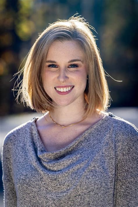 A Lovely Blonde Model Poses Outdoor While Enjoying The Fall Weather Stock Photo Image Of Adult