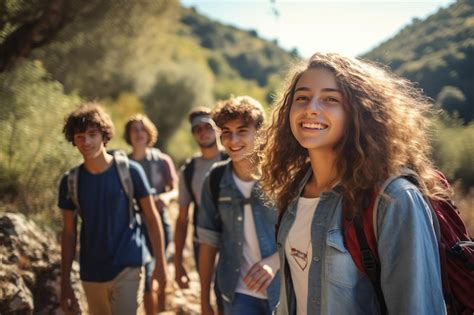 premium photo  group  teenagers hiking  enjoying nature