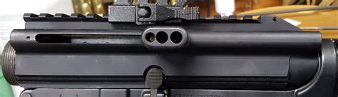 side charging upper comparison pistol caliber carbine brian enoss