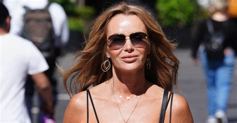 Amanda Holden Sizzles In The Pool As She Poses In Barely There Bikini