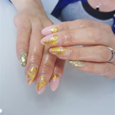 Nude Almond Acrylic Nails With Gold Sparkle