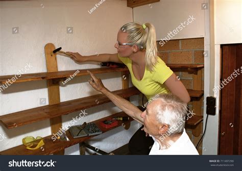 Smiling Blonde Granddaughter Her Grandfather Reconstructing Stock Photo 711497290 Shutterstock