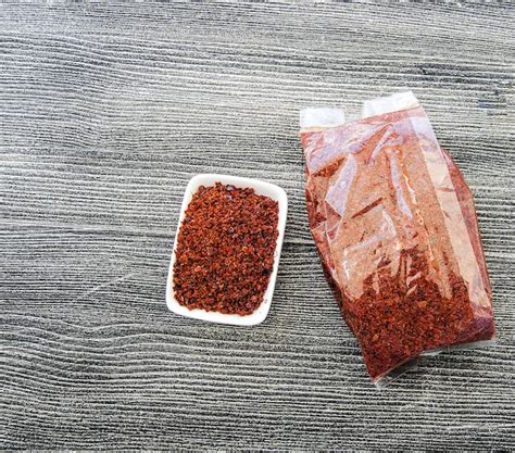 Premium Photo Finely Chopped Hot Pepper Chili Pepper In 1 Kg Package