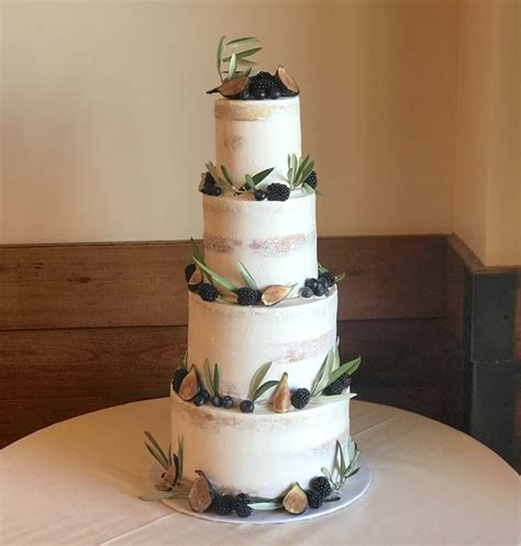 Semi Naked Wedding Cake With Fresh Blueberries Blackberries And Figs
