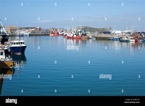 Fishing Boats Docked In The Howth Harbor Dublin Ireland Stock Photo