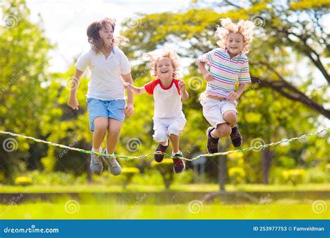 Happy Kids Play Outdoor Children Skipping Rope Stock Image Image Of