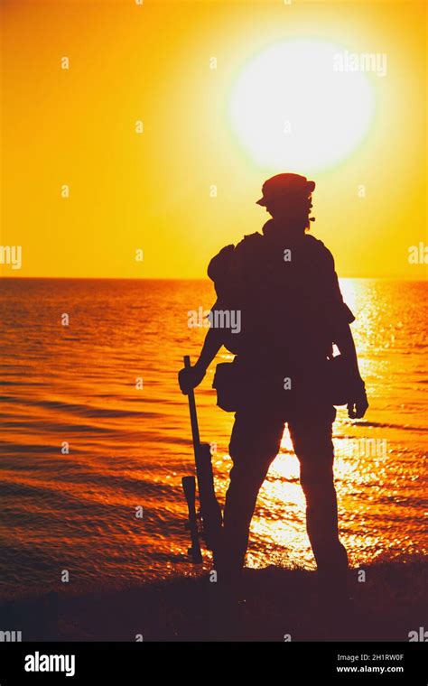 Silhouette Of Army Commando Fighter Navy Seals Team Sniper Or Coast