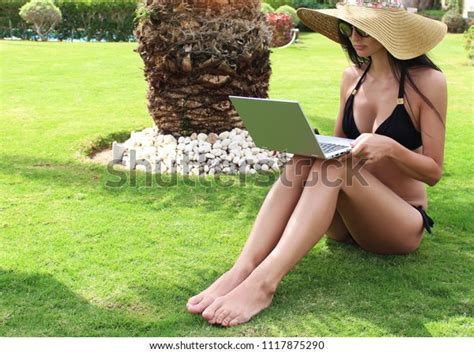 Sexy Girl Black Bikini Sits On Stock Photo 1117875290 Shutterstock