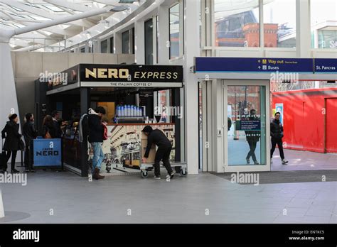 Customers At A Nero Express Coffee Shop At Kings Cross Station London