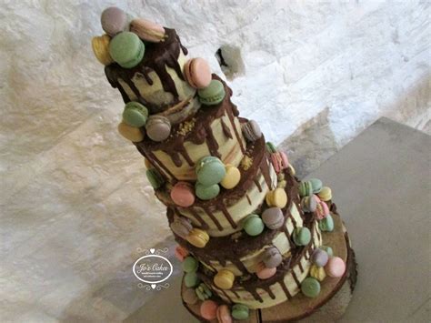 White Rose Cake Design Five Tier Semi Naked Drippy Wedding Cake With Macarons