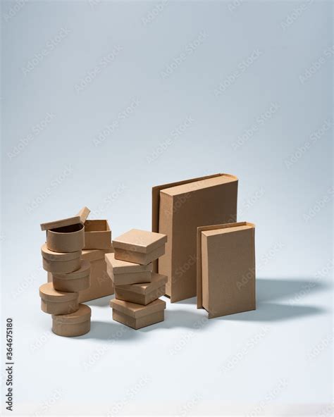 different types of cardboard packaging on a blue background Stock Photo | Adobe Stock