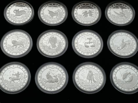 Набор серебряных монет Знаки зодиака. 2000 франков КФА 2014 ММД ...