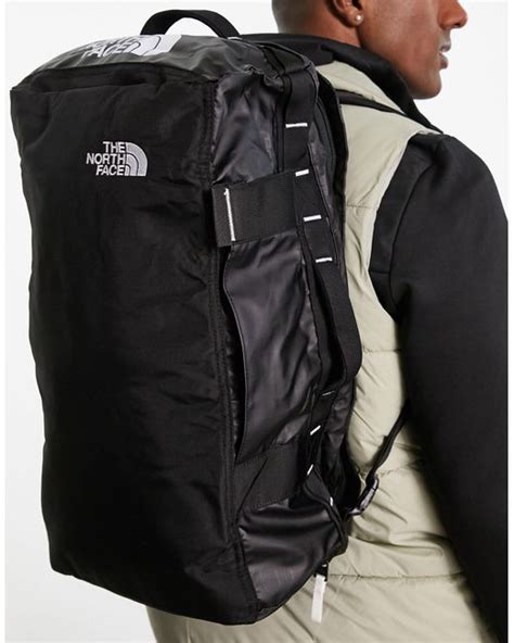 The North Face Base Camp Voyager 32l Duffel Bag In Black For Men Lyst