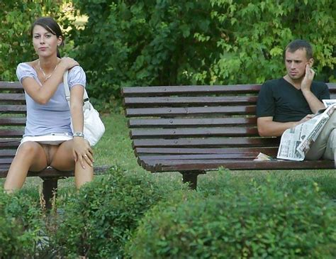 Sitting On A Park In A Short Skirt And Flashing Her Pussy