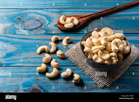 Natural Chestnut Inside Ceramic Pot On Blue Pine Wood Stock Photo Alamy