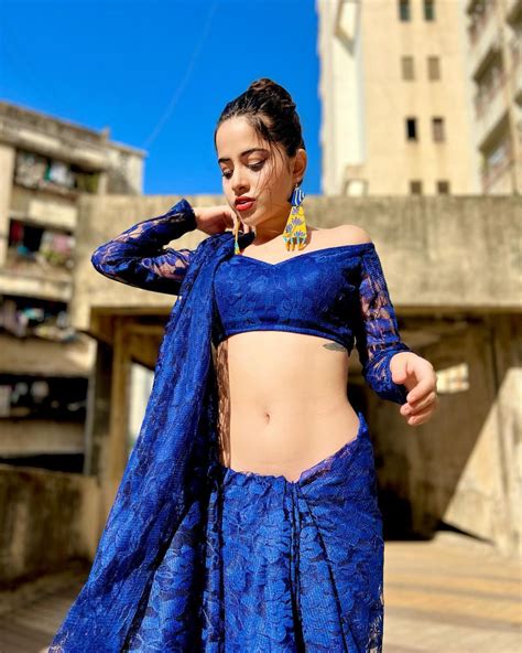 Urfi Javed Slays In This Low Waist Blue Saree See Latest Hot Photos