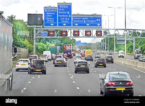 M25 Five Lane Busy Motorway At Junction 4b Gantry Destination Signs