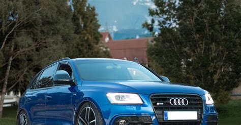 Blue Audi SQ5 on Road Near Mountain · Free Stock Photo