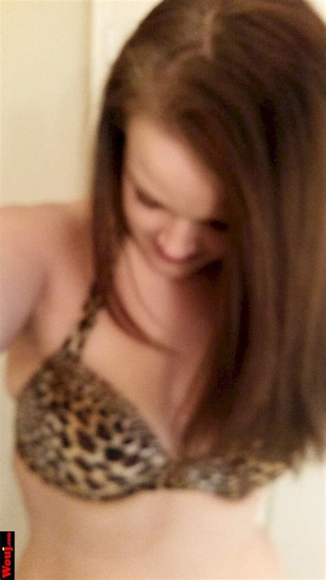Solo Cutie Taking Pictures Of Her Tits In A Leopard Print Bra Photos