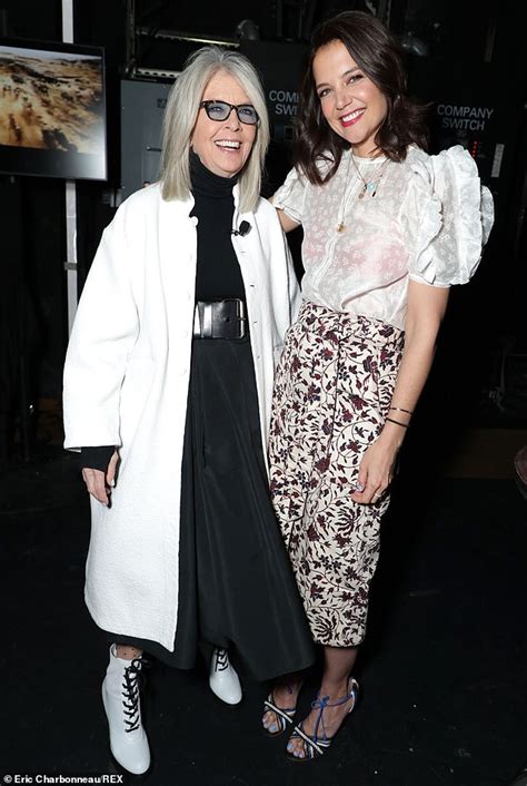 Katie Holmes Making An Impression As Her Sheer White Blouse Reveals A Hot Pink Bra Underneath