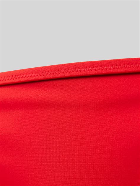 Kup online PUMA Figi bikini z bocznym wiązaniem czerwony