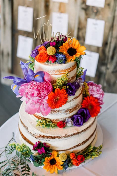 Wedding Cake Naked With Spring Flowers In 2024 Spring Wedding Cake Colorful Wedding Cakes